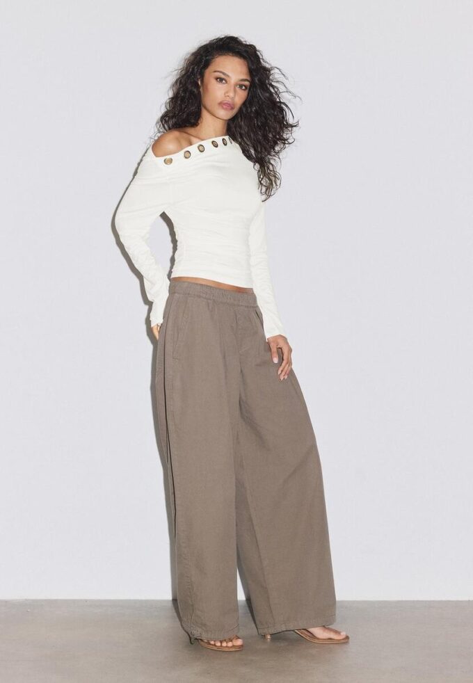 Asymmetric T-Shirt with Eyelets Asymmetric T-Shirt with Eyelets