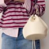 Rigid Eyelet Bucket Bag
