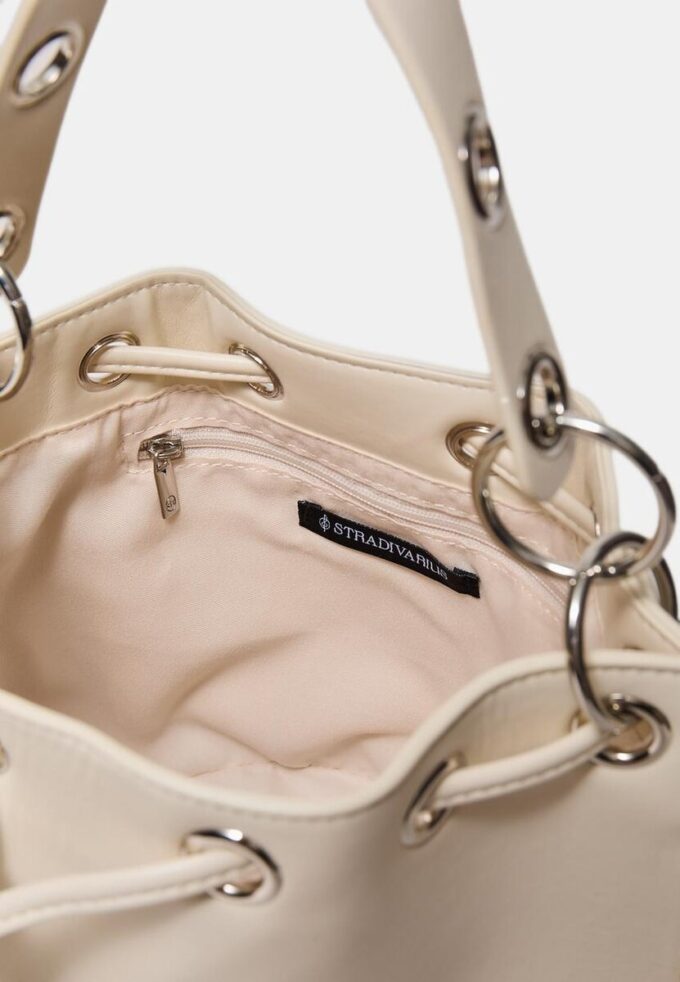 Rigid Eyelet Bucket Bag