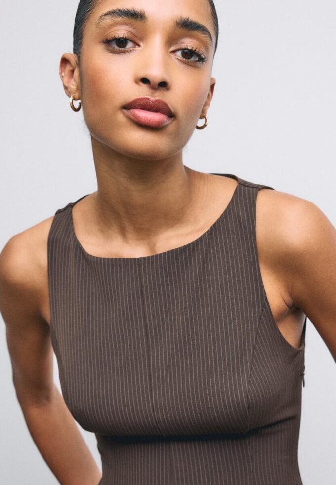 Sleeveless Peplum Top
